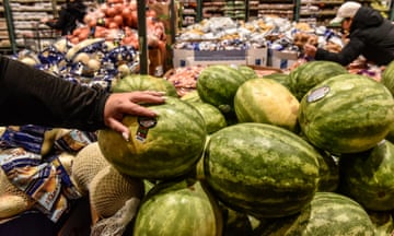 watermelons on display at a store