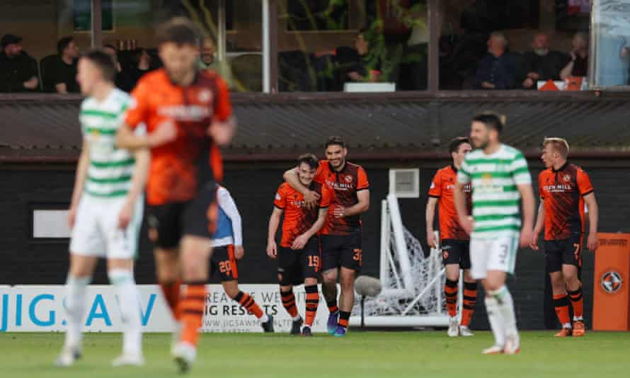 Dundee United's Dylan Levitt celebrates winning teammate Tony Watt and teammate equalizer.