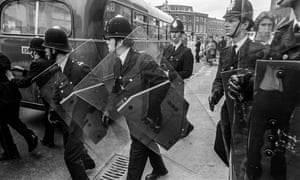 For the first time outside Northen Ireland, the police were equipped with heavy duty plastic riot shields