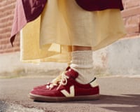 Burgundy Veja trainers with a yellow V