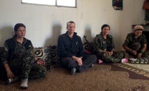 Carne Ross with members of the women’s militia in Rojava, Syria. The film is dedicated to Vijan, second right, who was killed fighting Isis a few months after this photo was taken