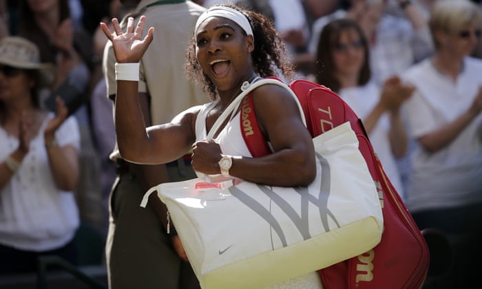 Serena Williams waves to the Royal Box as she walks off after her victory over Maria Sharapova