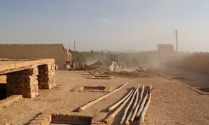 An image published by Isis purports to show jihadis bulldozing the Saint Eliane monastery in central Syria.
