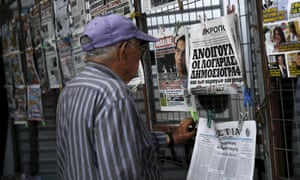A man reads a newspaper front page bearing a picture of Greek Prime Minister Alexis Tsipras in Athens June 18, 2015. Hopes of a breakthrough at Thursday’s gathering of European finance ministers, once seen as the last opportunity for an agreement, looked increasingly remote. REUTERS/Alkis Konstantinidis