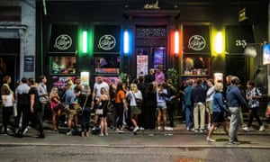 Coronavirus live news: nearly a fifth of South Africans may have had Covid; record new cases in the Netherlands - People gather in front of the Ibiza Beach Bar in Copenhagen last month.