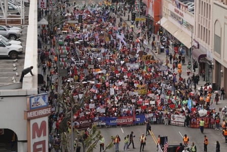 aerial view of people marching on a street