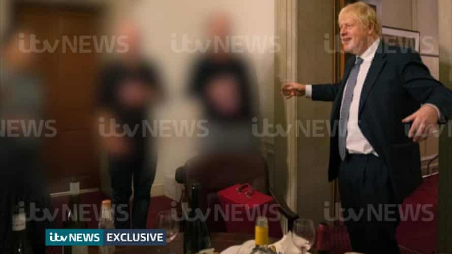 A photograph obtained by ITV News of the prime minister raising a glass at a leaving party on 13th November 2020.