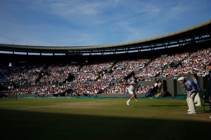 <strong>Day seven</strong><br>Novak Djokovic chases a ball during his match with Kevin Anderson on Court One