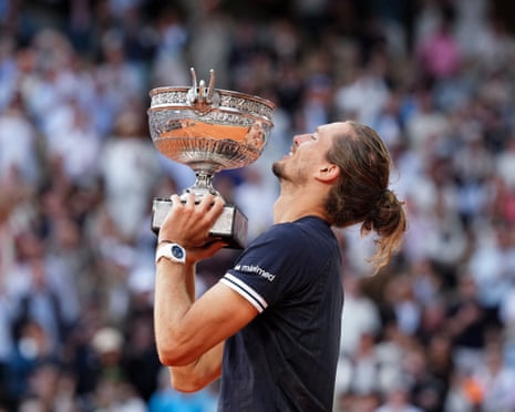 Alexander Zverev holds the Coupe des Mousquetaires after winning the men's final at Roland Garros.