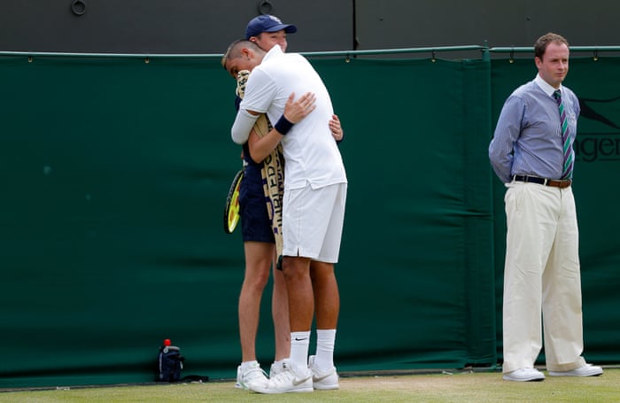 <strong>Day seven</strong><br>Nick Kyrgios hugs a ball boy during his defeat to Richard Gasquet on Court 2