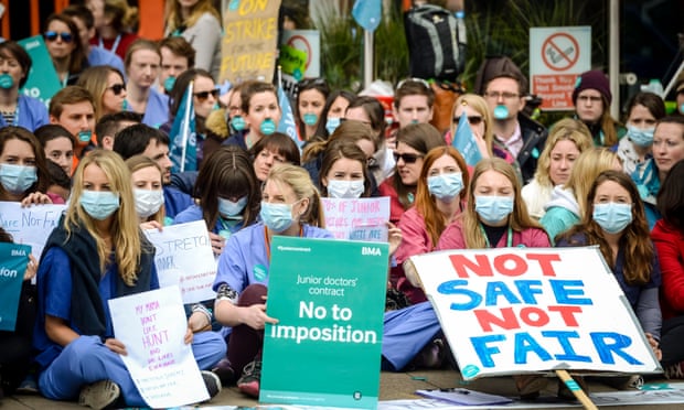 The GMC has issued an unusually severe warning: Junior doctors staging a silent protest outside Bristol Royal Infirmary during strike action earlier in the year. Photograph: Ben Birchall/PA Wire