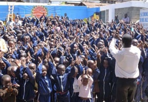 Principal Daniel Ochieng along with pupils at Magoso: 'We have become a role model in order to schools in Kenya.'