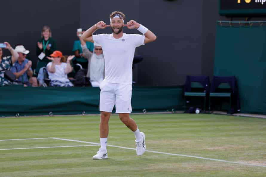 Liam Broady celebrates after defeating Diego Schwartzman.