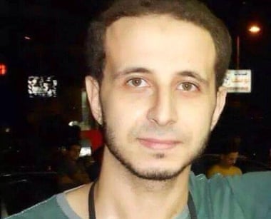 Karim Hamdy was arrested after security officers burst into his apartment.