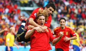 Fernando Torres celebrates with David Villa after scoring the opening goal at Euro 2008 against Sweden.