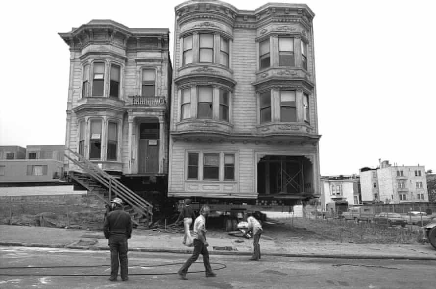 Worker in front of the house