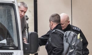John Worboys is escorted in handcuffs into the royal courts of justice.