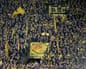 Dortmund fans display banners demanding a boycott of the 2022 FIFA World Cup in Qatar during the German first division Bundesliga football match between Borussia Dortmund and VfL Bochum in Dortmund, western Germany on November 5, 2022.
