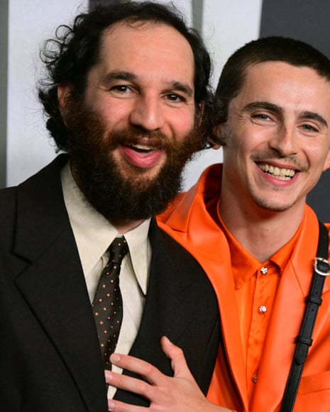 US-ENTERTAINMENT-FILMUS-French actor Timothee Chalamet (R) and US director Josh Safdie attend the premiere of "Marty Supreme" in Los Angeles, California, on December 8, 2025. (Photo by Frederic J. Brown / AFP via Getty Images)