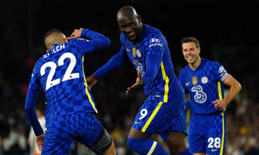 Chelsea's Romelu Lukaku celebrates scoring their team's third goal in a match against their teammates.