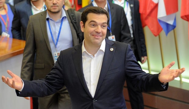 Greek Prime Minister Alexis Tsipras leaves at the end of an Eurozone summit