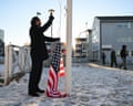 Maxi Schafroth attaching a US flag to a flagpole