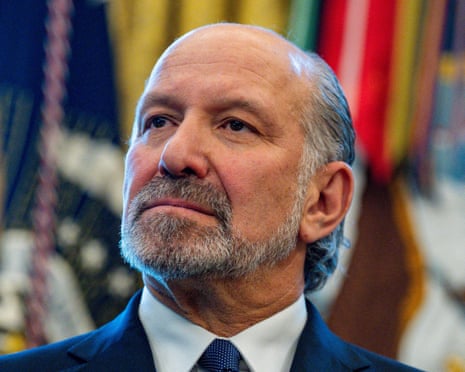 Howard Lutnick looks on as President Donald Trump announces the creation of a critical minerals reserve during an event in the Oval Office at the White House, 2 February 2026.