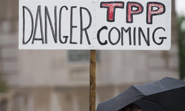 Demonstrators protest against the legislation to give US President Barack Obama fast-track authority to advance trade deals, including the Trans-Pacific Partnership (TPP), during a protest march on Capitol Hill in Washington on 21 May.