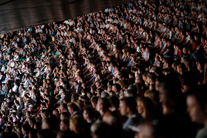 <strong>Day three</strong><br>Spectators watch from the back of Centre Court