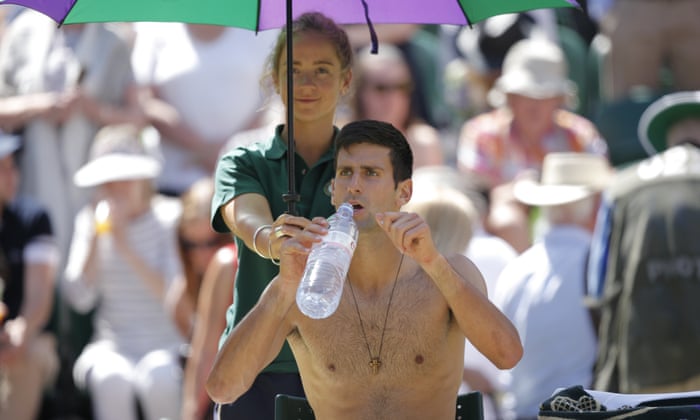 Djokovic needing hydration in the heat