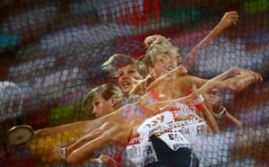 A multiple exposure shows the technique of Nadine Müller as she competes in the women’s discus final 