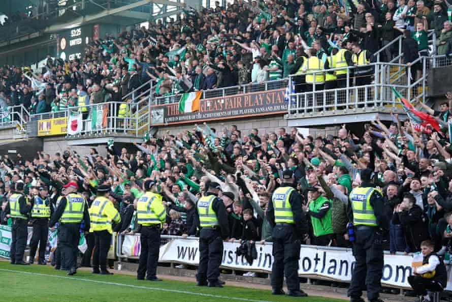 Celtic fans at the stand celebrate after Georgios Musk Makis leads the visitor.