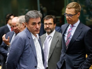 Eurogroup Finance ministers meeting<br>epa04843524 Greek Finance Minister Euclid Tsakalotos (L) and Finnish Finance Minister Alexander Stubb talk at the start of a special Eurogroup finance ministers meeting on the Greek crisis, at the European Council headquarters in Brussels, Belgium, 12 July 2015. Eurozone Finance Ministers set 12 July 2015 as the deadline to reach an agreement saving Greece from bankruptcy, amid warnings that failure to strike a deal by then could lead the country to crash out of the eurozone. EPA/OLIVIER HOSLET