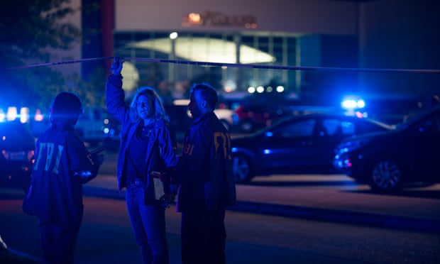 Federal investigators at the scene of the shooting.