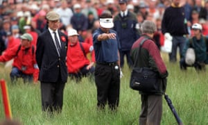 Jean Van De Velde drops the ball to play his penalty shot at the 18th where he had a triple bogey to finish in a three-way tie before Paul Lawrie emerged the winner after a playoff.