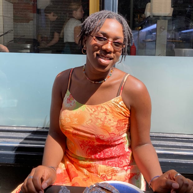 ‘Don’t just cancel things’: readers on Britain’s period of national mourning | Queen Elizabeth II 2 Shekinah Opara smiles at the camera. She is wearing an orange and red pattern dress
