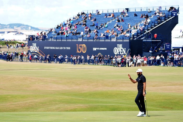 Dustin Johnson celebrates his birdie on the 18th.