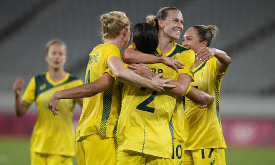Matildas skipper Sam Kerr celebrates with teammates after her goal against New Zealand.