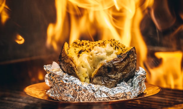 A fire-cooked jacket potato at Pascor
