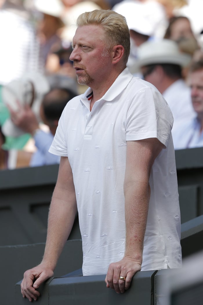 As Djokovic'a coach, former champion Boris Becker looks on with concern
