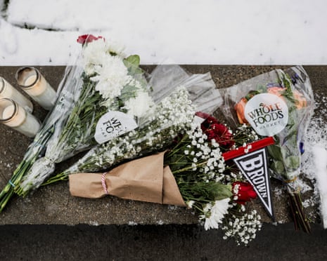 Flowers and candles rest on campus at Brown University