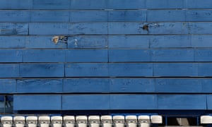 Worn press seats at the Outdoor Olympic Swimming Pool of the Olympic Complex.