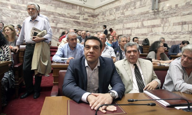Alexis Tsipras with MPs at the Greek Parliament in Athens. 