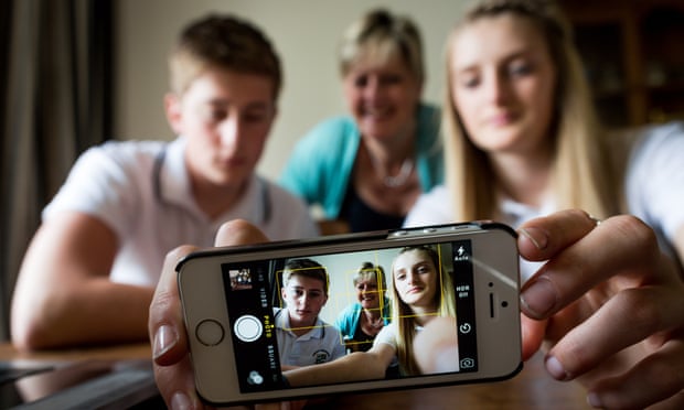 Debbie Bird and her children James, 15, and Charlotte, 13, who are all unplugging their electronic gadgets this weekend for National Unplugging Day.