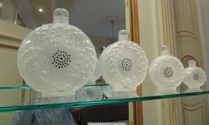 Going for a song: a set of four Lalique France Dahlia crystal perfume bottles.