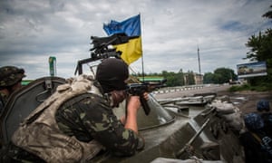 Ukrainian soldiers at an army checkpoint near Sloviansk.
