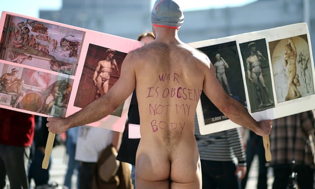 an activist protests San Francisco’s ban on nudity at San Francisco City Hall in 2013.