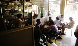 Men in a cafe in Asmara, Eritrea. Much of the city's architecture was built by Italian colonisers in the 1930s.