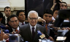 Alejandro Maldonado is surrounded by the media after being sworn in as Guatemala’s vice-president in Guatemala City on Thursday. 