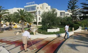 The scene outside the Imperial Marhaba hotel near the Tunisian resort town of Sousse. At least five British tourists and one Irish woman were reported dead.
